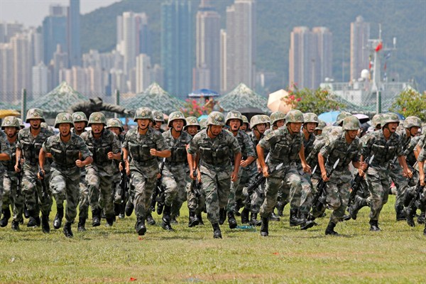 Chinese People’s Liberation Army soldiers during an exercise at Stonecutter Island naval base, in Hong Kong, June 30, 2019 (AP photo by Kin Cheung).