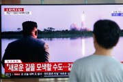 A man watches a TV showing an image of a North Korean missile launch during a news program at the Seoul Railway Station in Seoul, South Korea, Aug. 6, 2019 (AP photo by Ahn Young-joon).