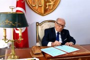 Tunisian President Beji Caid Essebsi, the country’s first democratically elected president, signs a decree a few weeks before his passing in Tunis, July 5, 2019 (Photo by Slim Abid/Tunisian Presidency via AP Images)