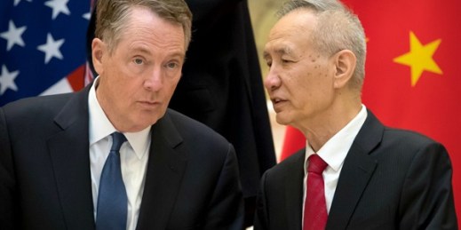 Chinese Vice Premier Liu He, right, talks with U.S. Trade Representative Robert Lighthizer at the Diaoyutai State Guesthouse, in Beijing, Feb. 15, 2019 (AP photo by Mark Schiefelbein).