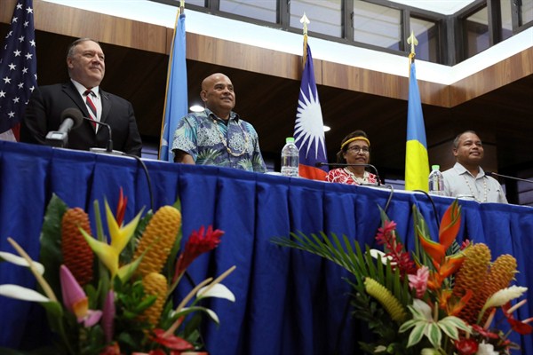 U.S. Secretary of State Mike Pompeo, left, holds a news conference with the leaders of Palau, the Marshall Islands and the Federated States of Micronesia, in Kolonia, Micronesia, Aug. 5, 2019 (pool photo by Jonathan Ernst of Reuters via AP Images).