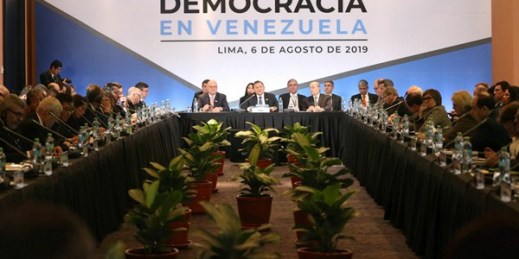 Peruvian Foreign Minister Nestor Popolizio, center, speaks at a conference of more than 50 nations that largely support Venezuelan opposition leader Juan Guaido, in Lima, Peru, Aug. 6, 2019 (AP photo by Martin Mejia).