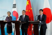 From left, South Korean Foreign Minister Kang Kyung-wha, Chinese Foreign Minister Wang Yi and Japan’s then-foreign minister, Taro Kono, at a press conference in Beijing, Aug. 21, 2019 (pool photo by Wu Hong of European Pressphoto Agency via AP Images).