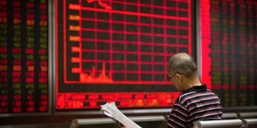 A Chinese investor monitors stock prices at a brokerage house in Beijing, Aug. 30, 2019 (AP photo by Mark Schiefelbein).