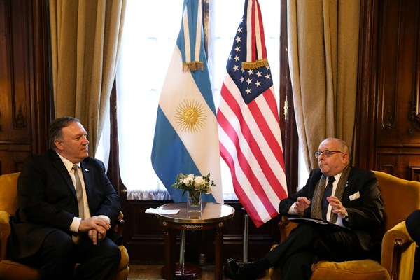 U.S. Secretary of State Mike Pompeo and Argentine Foreign Minister Jorge Faurie during a meeting on the sidelines of an international counterterrorism conference in Buenos Aires, Argentina, July 19, 2019 (AP photo by Natacha Pisarenko).