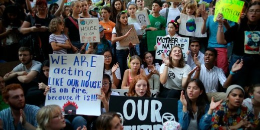 Swedish environmental activist Greta Thunberg, center, participates in a demonstration in front of the United Nations, in New York, Aug. 30, 2019 (AP photo by Mary Altaffer).