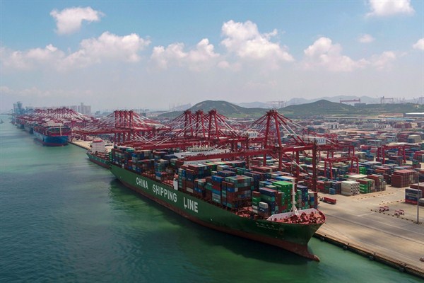 A container ship docked at a port in Qingdao, in eastern China’s Shandong province, Aug. 6, 2019  (Chinatopix photo via AP Images).