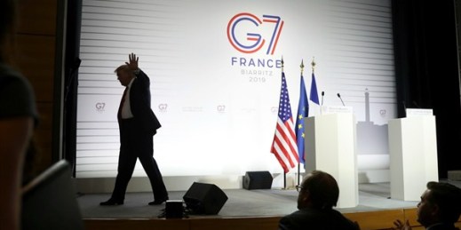 President Donald Trump walks off after a joint press conference with French President Emmanuel Macron at the G-7 summit in Biarritz, France, Aug. 26, 2019 (AP photo by Andrew Harnik).