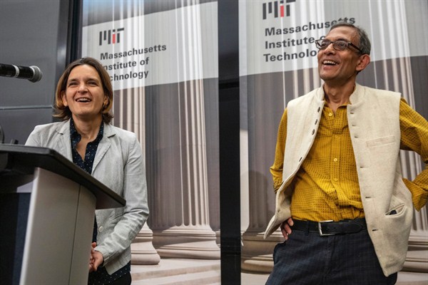 Esther Duflo and Abhijit Banerjee, who along with Michael Kremer were awarded this year's Nobel Prize in economics, at a news conference at Massachusetts Institute of Technology, Oct. 14, 2019 (AP photo by Michael Dwyer).