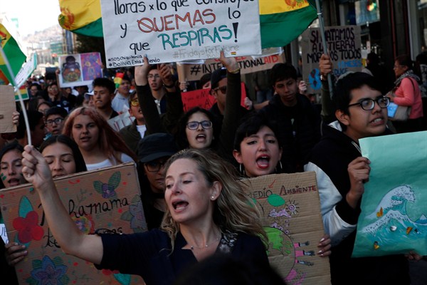 Activists participate in a global protest on climate change, in La Paz, Bolivia, Sept. 27, 2019 (AP photo by Juan Karita).