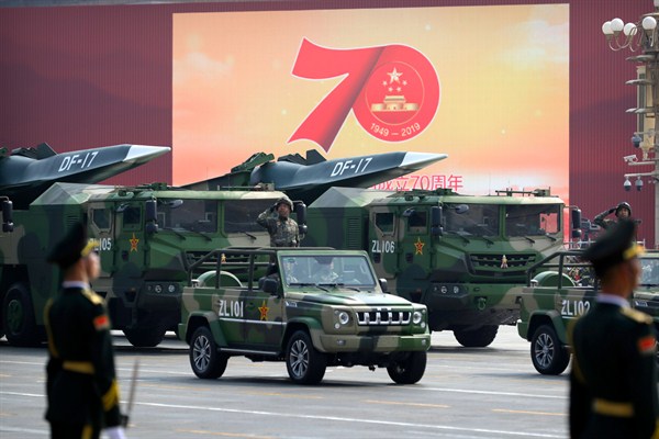 Chinese military vehicles carry DF-17 ballistic missiles during a parade to commemorate the 70th anniversary of the founding of Communist China, in Beijing, Oct. 1, 2019 (AP photo by Mark Schiefelbein).