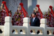 Chinese President Xi Jinping walks past floral wreaths at the Monument to the People’s Heroes during a ceremony to mark Martyr’s Day at Tiananmen Square in Beijing, Sept. 30, 2019 (AP photo by Mark Schiefelbein).