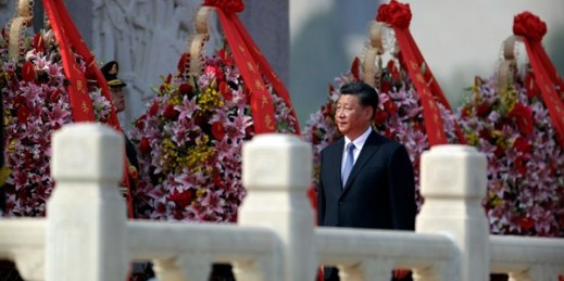 Chinese President Xi Jinping walks past floral wreaths at the Monument to the People’s Heroes during a ceremony to mark Martyr’s Day at Tiananmen Square in Beijing, Sept. 30, 2019 (AP photo by Mark Schiefelbein).