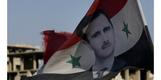 Cover photo: A Syrian national flag with the picture of the President Bashar al-Assad hangs at an army checkpoint in the town of Douma in the eastern Ghouta region outside Damascus, July 15, 2018 (AP photo by Hassan Ammar).