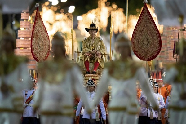Thai King Maha Vajiralongkorn is carried on a palanquin through the streets outside the Grand Palace during the second day of his coronation ceremony in Bangkok, May 5, 2019 (AP photo by Wason Wanichorn).