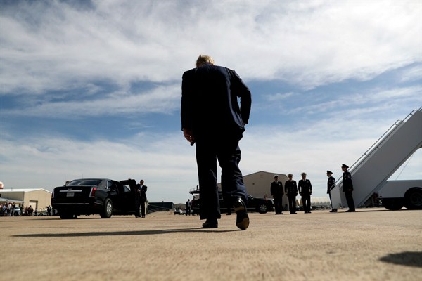 President Trump walks away after speaking about Turkey at Naval Air Station Joint Reserve Base in Fort Worth, Texas, Oct. 17, 2019 (AP photo by Andrew Harnik).