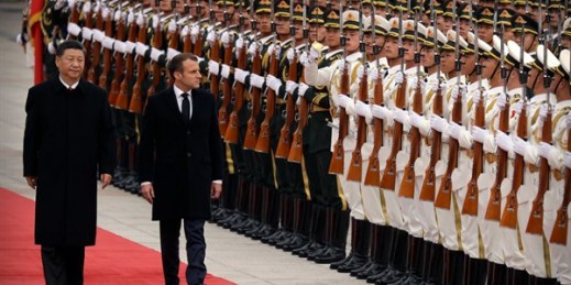 Chinese President Xi Jinping and French President Emmanuel Macron review an honor guard during a welcome ceremony at the Great Hall of the People, Beijing, Nov. 6, 2019 (AP photo by Mark Schiefelbein).