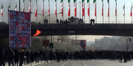 Smoke rises during a protest after authorities raised gasoline prices, in the central city of Isfahan, Iran, Nov. 16, 2019 (AP photo).
