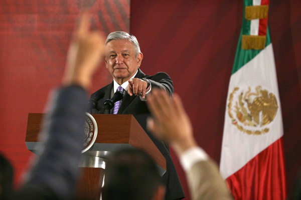 Mexican President Andres Manuel Lopez Obrador takes a question from a reporter during his daily morning press conference at the National Palace in Mexico City, Nov. 13, 2019 (AP photo by Marco Ugarte).