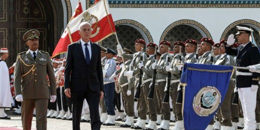 Tunisian President Kais Saied, second from left, inspects an honor guard upon his arrival at Carthage Palace after his swearing-in ceremony, Carthage, Tunisia, Oct. 23, 2019 (DPA photo by Khaled Nasraoui via AP Images).