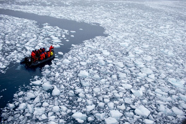 A zodiac carrying a team of international scientists heads to Chile's Bernardo O'Higgins research station in Antarctica, where polar ice is melting rapidly, Jan. 22, 2015 photo, a  (AP photo by Natacha Pisarenko).