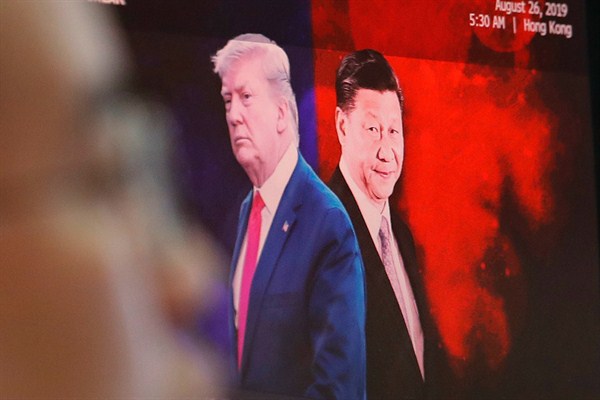 A computer screen shows images of Chinese President Xi Jinping and U.S. President Donald Trump, Seoul, South Korea, Sept. 13, 2019 (AP photo by Ahn Young-joon).