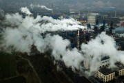 Smoke and steam rise from a coal processing plant in Hejin in central China’s Shanxi Province, Nov. 28, 2019 (AP photo by Sam McNeil).