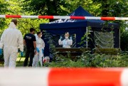 Forensic officers at the scene of the murder of Zelimkhan Khangoshvili, a Georgian asylum-seeker believed killed by Russian agents, Berlin, Germany, Aug. 23, 2019 (Photo by Christoph Soeder for dpa via AP Images).