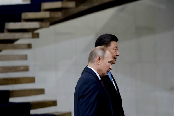 Russian President Vladimir Putin and Chinese President Xi Jinping at the BRICS summit at the Itamaraty palace in Brasilia, Brazil, Nov. 14, 2019 (AP photo by Eraldo Peres).