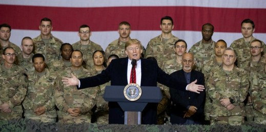 President Donald Trump addresses members of the military during a surprise Thanksgiving Day visit to Afghanistan, Bagram Air Field, Nov. 28, 2019 (AP photo by Alex Brandon).