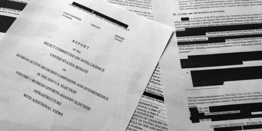 Pages from the Senate Intelligence Committee report that details Russian interference in the 2016 U.S. election, photographed in Washington, July 26, 2019 (AP photo by Jon Elswick).