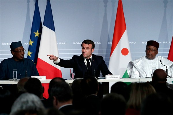 French President Emmanuel Macron, center, Nigerien President Mahamadou Issoufou, right, and Chadian President Idriss Deby during a press conference in Pau, France, Jan. 13, 2020 (Photo by Guillaume Horcajuelo for EPA via AP Images).