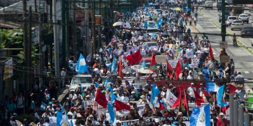 A protest against President Jimmy Morales' decision to end the work of a U.N. anti-corruption commission, Guatemala City, Sept. 20, 2018 (AP photo by Moises Castillo).