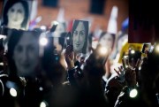 Protesters hold pictures of slain journalist Daphne Caruana Galizia outside Prime Minister Joseph Muscat’s office, in Valletta, Malta, Nov. 29, 2019 (AP photo by Rene Rossignaud).