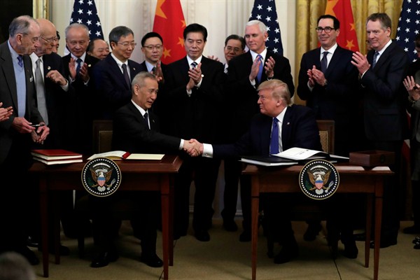 President Donald Trump and Chinese Vice Premier Liu He shake hands after signing the “phase one” trade agreement in the East Room of the White House, Washington, Jan. 15, 2020 (AP photo by Evan Vucci).