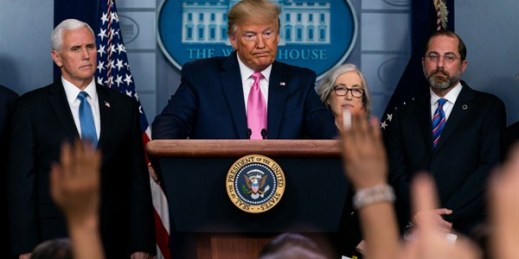 President Donald Trump, with members of his coronavirus task force, speaks during a news conference at the White House, Washington, Feb. 26, 2020 (AP photo by Evan Vucci).