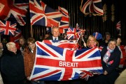 Brexit supporters celebrate the U.K.’s official exit from the European Union, at a rally outside Stormont, the seat of the Northern Ireland Assembly in Belfast, Jan. 31, 2020 (AP photo by Peter Morrison).
