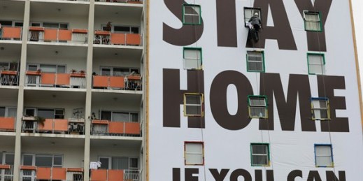 A billboard is installed on an apartment building in Cape Town, South Africa, March 25, 2020 (AP photo by Nardus Engelbrecht).