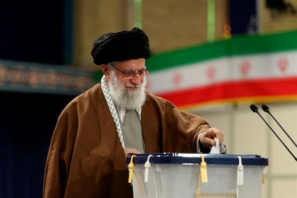 Iranian Supreme Leader Ayatollah Ali Khamenei casts his ballot in parliamentary elections, in Tehran, Feb. 21, 2020 (Office of the Iranian Supreme Leader photo via AP Images).