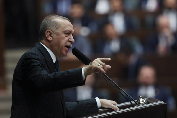 Turkish President Recep Tayyip Erdogan addresses members of his ruling party in parliament, in Ankara, March 4, 2020 (AP photo by Burhan Ozbilici).