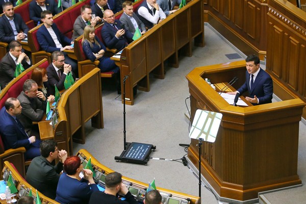 Ukrainian President Volodymyr Zelenskiy addresses lawmakers during a parliamentary session in Kyiv, Ukraine, March 4, 2020 (Sputnik photo via AP Images).