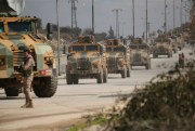 A Turkish military convoy in Idlib province, Syria, Feb. 22, 2020 (AP photo by Ghaith Alsayed).