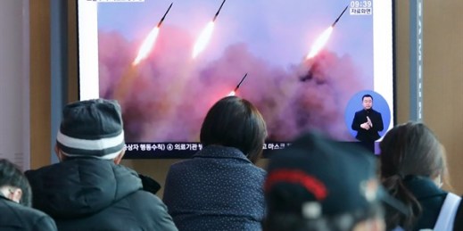 People watch a TV showing images of North Korean missiles during a news program at the Seoul Railway Station in Seoul, South Korea, March 9, 2020 (AP photo by Ahn Young-joon).