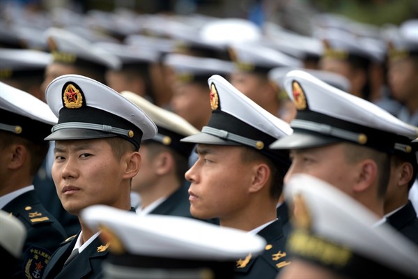 Chinese sailors at a concert featuring Chinese and foreign military bands in Qingdao, China, April 22, 2019 (AP photo by Mark Schiefelbein).