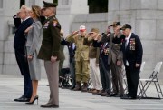 Veterans watch President Donald Trump and First Lady Melania Trump participate in a World War II commemoration in Washington, May 8, 2020 (AP photo by Evan Vucci).