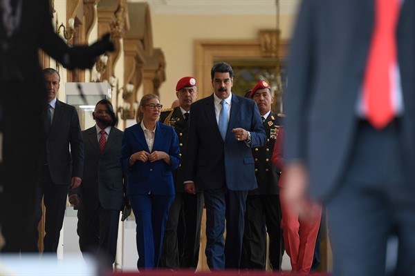Venezuelan President Nicolas Maduro arrives for a press conference at the Miraflores Presidential Palace in Caracas, Venezuela, March 12, 2020 (AP photo by Matias Delacroix).