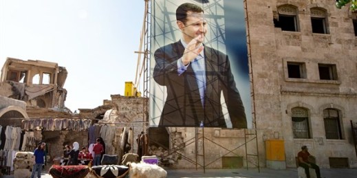 A portrait of Syrian President Bashar al-Assad in the Old City of Aleppo, Sept. 27, 2019 (AP photo by Alexander Zemlianichenko).