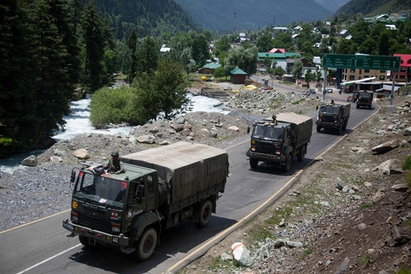 An Indian army convoy moves on the Srinagar-Ladakh highway at Gagangeer, northeast of Srinagar, India, June 17, 2020 (AP photo by Mukhtar Khan).