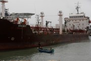 An oil tanker sits at a naval dock yard after being rescued from pirates, in Lagos, Nigeria, Feb. 22, 2016 (AP photo by Sunday Alamba).