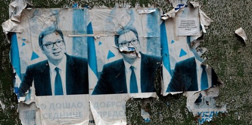 Remains of posters of Serbian President Aleksandar Vucic on a wall in an ethnic Serb-dominated part of Mitrovica, Kosovo, Oct. 6, 2019 (AP photo by Darko Vojinovic).